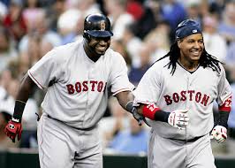 David Ortiz (z) y Manny Ramírez