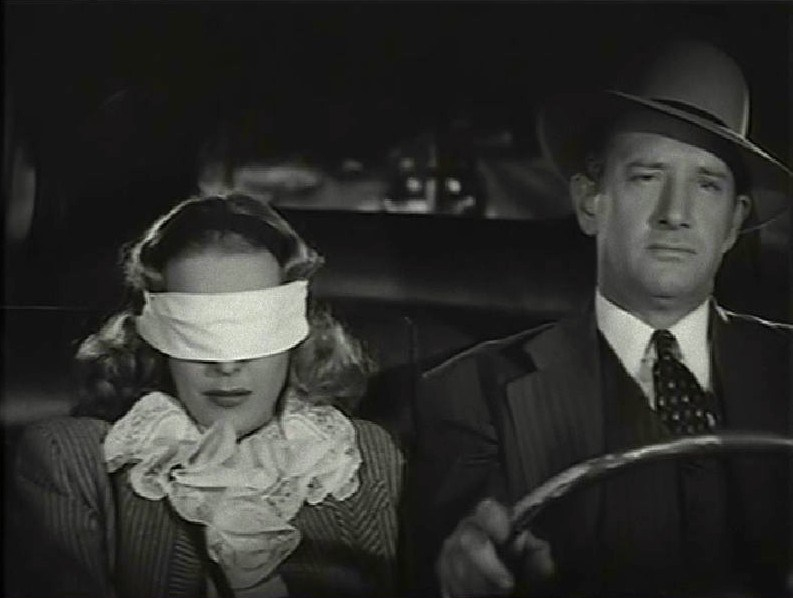 Jack Ingram y Joan Woodbury en una escena de Brenda Starr, reporter