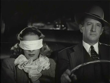 Jack Ingram y Joan Woodbury en una escena de Brenda Starr, reporter